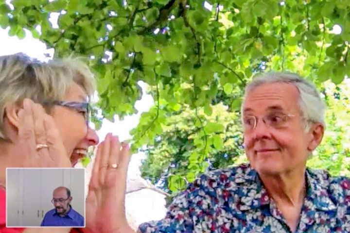 Robin & Walt Tickner, under a fruit tree in Normandy, just heard their sales price!