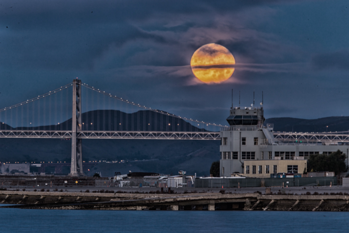 Moonset behind Alameda Naval Air Station Museum, Oakland Bay Bridge, Christmas morning 2015-12-25